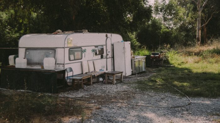 white and brown camper trailer