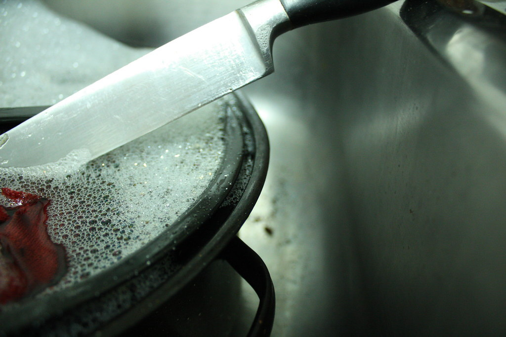 To clean rust, soak your knives in a dish with soap and hot water